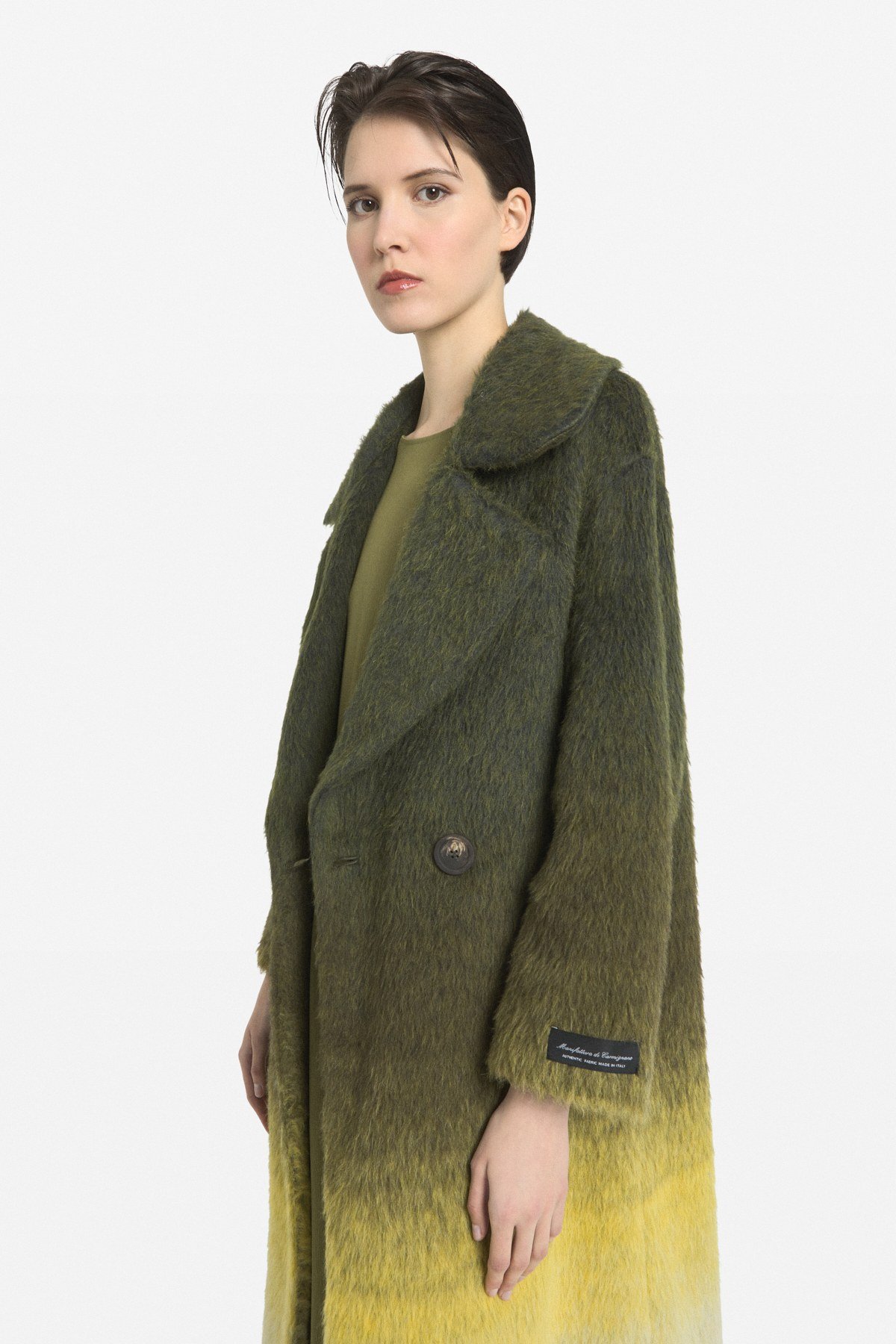 Coat with side fastening