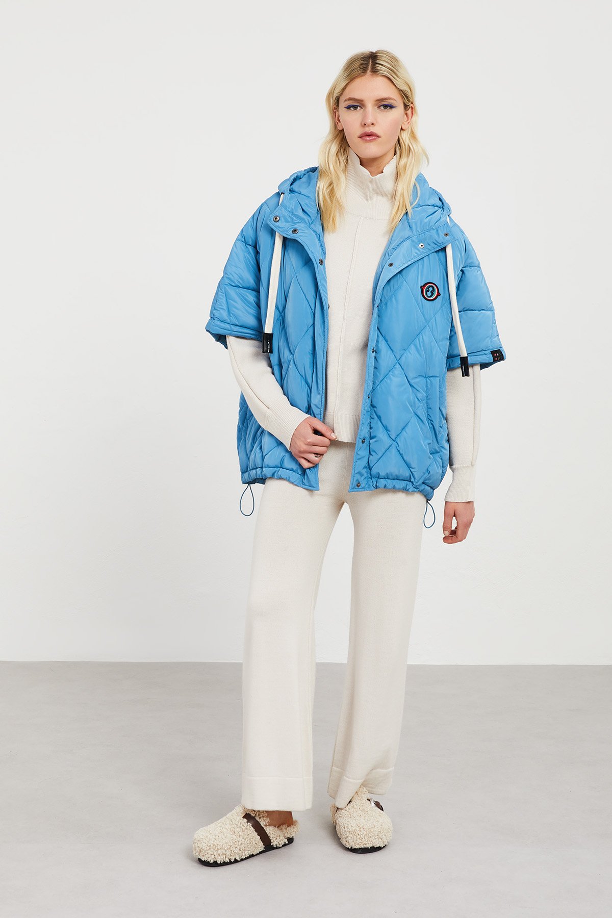 Cape-style puffer jacket